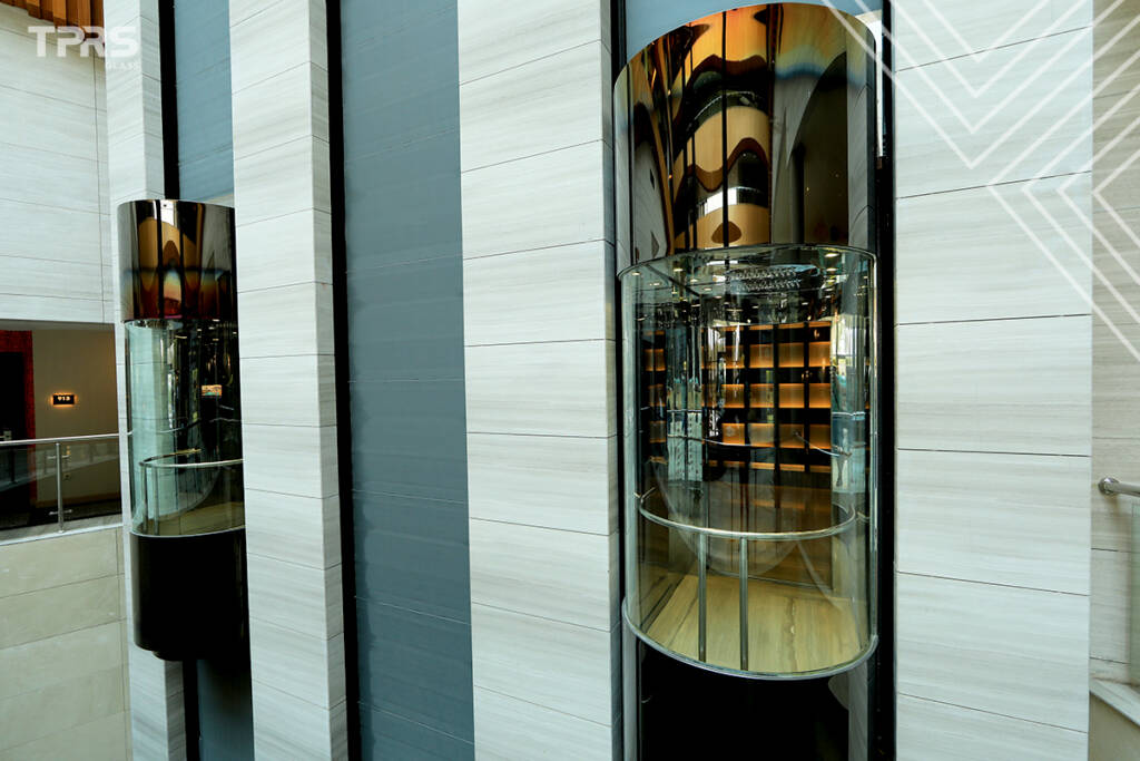 Glass Elevators: Elevating Modern Architecture with TPRS Glass Solutions