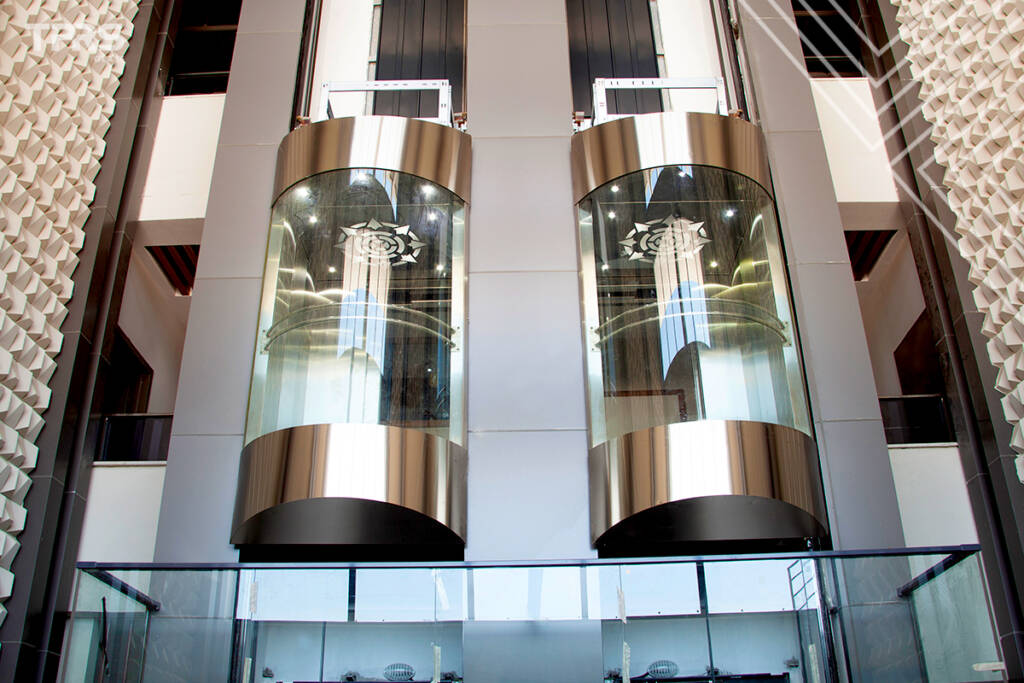 Glass Elevators: Elevating Modern Architecture with TPRS Glass Solutions